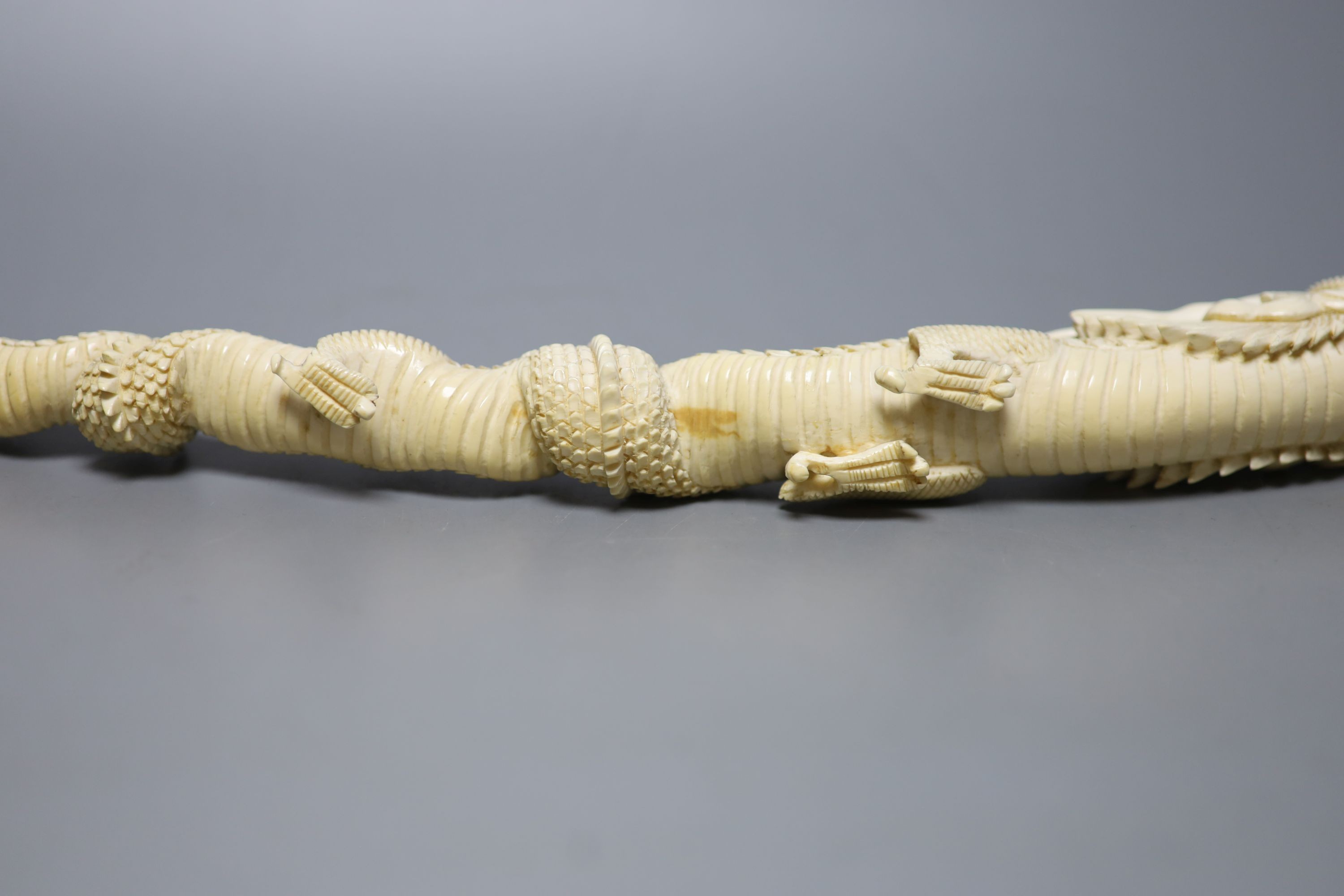 An Indonesian ivory carving of a dragon, first half of 20th century 52cm, , An Indonesian ivory carving of a dragon, first half of 20th century